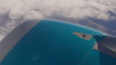 Airplane engine flying after taking off Stock Footage 322960942