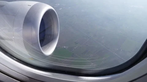 Airplane engine flying over agricultural fields Stock Footage 339353106