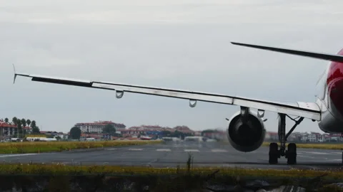 Airplane Engine Thrust on Wet Runway Stock Footage 332456284