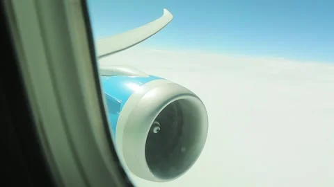 Airplane engine, view from the body. Clouds in the background Stock Footage 163085524