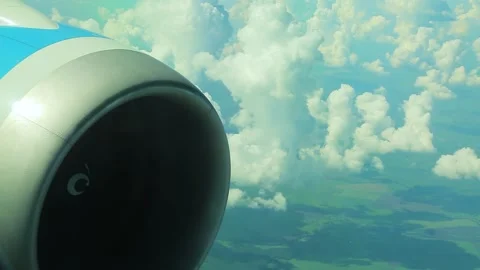 Airplane engine, view from the inside. Big clouds in the background Stock Footage 163085580