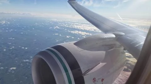 Airplane engine while in flight Stock Photos