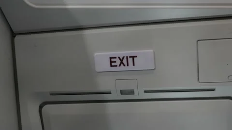 Airplane exit light illuminating Stock Footage 221729265