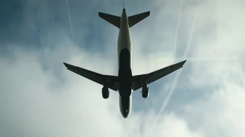Airplane on final approach, viewed from below Video stock 144510472