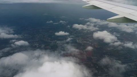 Airplane flies above the clouds Stock Footage 172892873