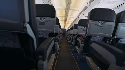 Airplane flies into the air, view on the interior of the plane. Stock Footage 76697029