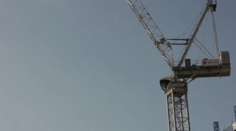 Airplane flies by crane 스톡 동영상 23113524