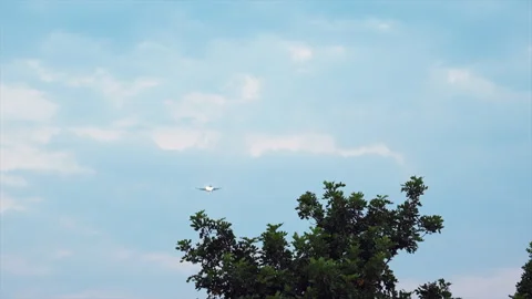 Airplane flies in the sky Stock Footage 280120288