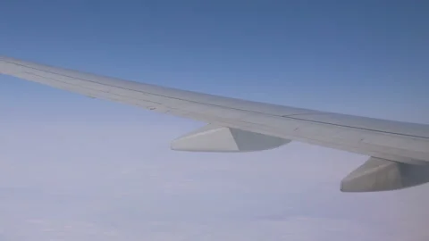Airplane flight above the clouds in 4K Stock-Footage 171718345