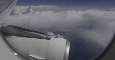 Airplane flight, clouds close up, 4K Stock Footage 221252785