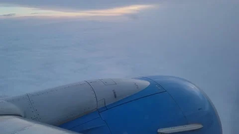 Airplane flight in the clouds. View from the airplane window. Video stock 192984585