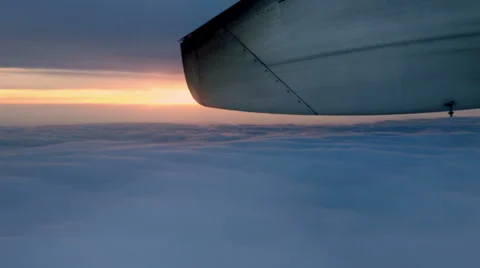 Airplane in flight during sunset Stock Footage 35304338