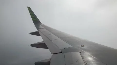 Airplane Flight Pass Through White Clouds. Stock Footage