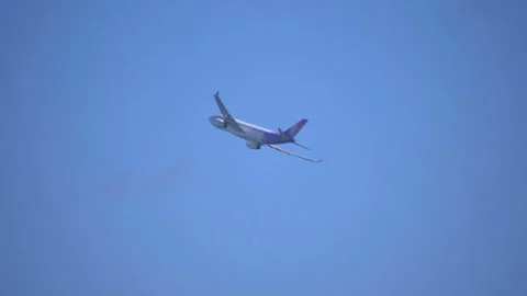 Airplane flight on the sky in slow motion 180fps Stock Footage 165053676