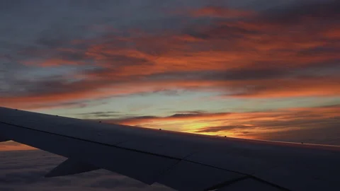 Airplane flight, start landing. Wing of an airplane flying close to the cloud Stock Footage 178563629