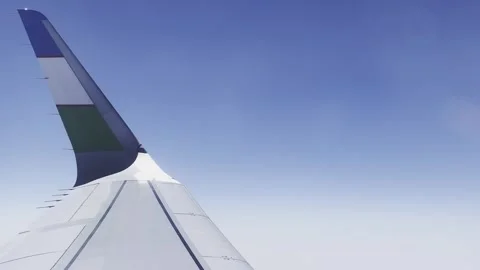 Airplane flight. View from the window on the wing of an airplane flying. Stock-Footage 243449553