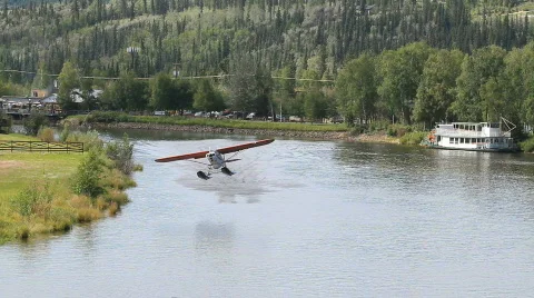 Airplane float takeoff from river Fairbanks Alaska HD Stock Footage 787094