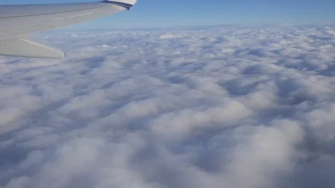 Airplane fly above the clouds Stock Footage 105056843