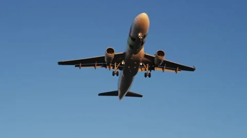Airplane fly away though the blue sky. Large passenger airplane is taking off Stock-Footage 266753700