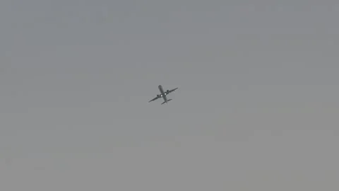 Airplane fly blue sky background. Plane vacation travel. Aviation flight. Stock Footage 330519651