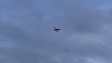 Airplane fly on blue sky Stock Footage 90784816