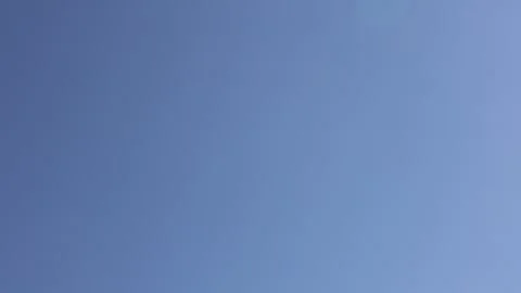 Airplane fly in blue sky , Jet airplane landing 4k Video - air travel Stock Footage 330578501