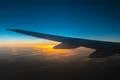 The airplane fly in the evening sky Photo