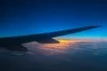 The airplane fly in a night sky Photo