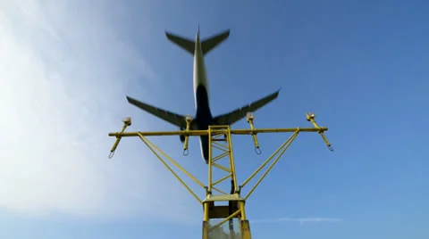 Airplane fly over runway light wide slow motion 11038 Stock Footage 27182659