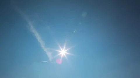 Airplane fly over with sun1 Stock-Footage 10844927