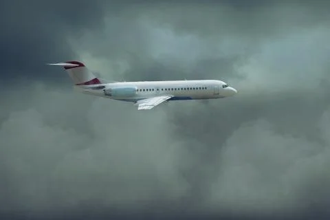 Airplane at fly on the sky with clouds Stock Photos