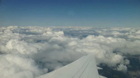 Airplane Flying Above Clouds Stock Footage 37144133