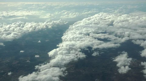 The Airplane is Flying Above the Clouds Stock Footage 54769459