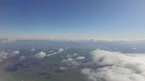 The Airplane is Flying Above the Clouds Stock Footage 60437779