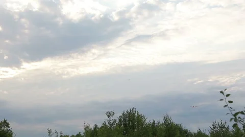 Airplane flying above clouds Stock Footage