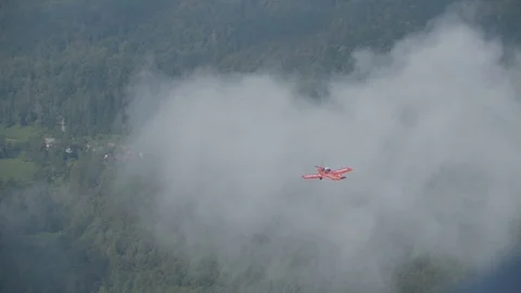 Airplane flying above the clouds 스톡 동영상 93398557
