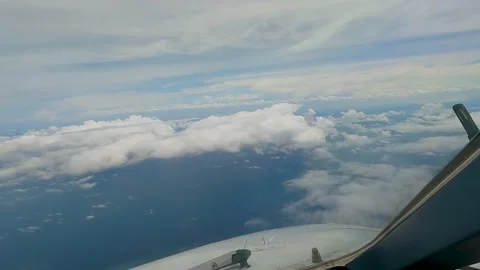 Airplane flying above clouds Stock Footage 231658713