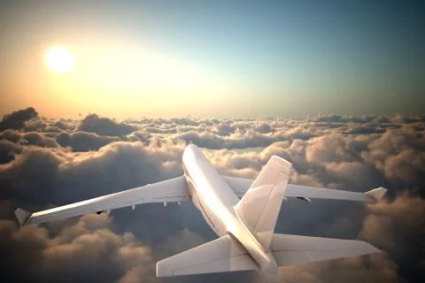 Airplane flying above clouds Stock Photos