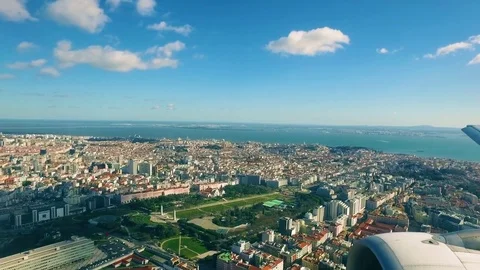 Airplane is Flying Above the Lisbon Stock Footage 72005283