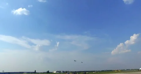 Airplane flying on blue sky Stock Footage 79751796