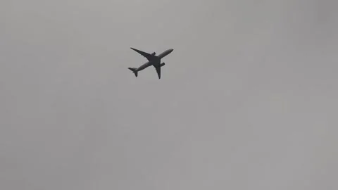 Airplane Flying in Cloudy Sky Stock-Footage 315355657