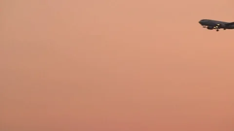 Airplane Flying During Sunset Stock Footage 78118597