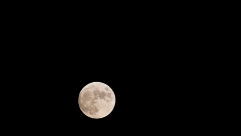 Airplane flying in front of moon at night Stock Footage 167426406