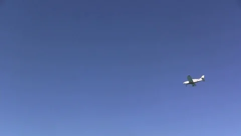 Airplane flying over beach Stock Footage 88437633
