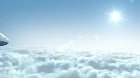 Airplane flying over clouds Stock Footage 10734600