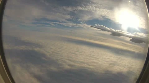 Airplane Flying over Clouds Stock Footage 11152769
