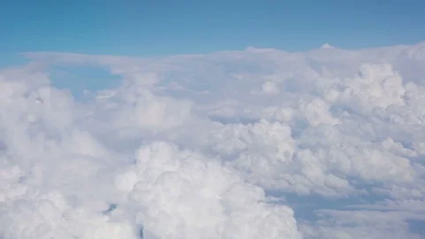 Airplane Flying over clouds Stock Footage 79916406