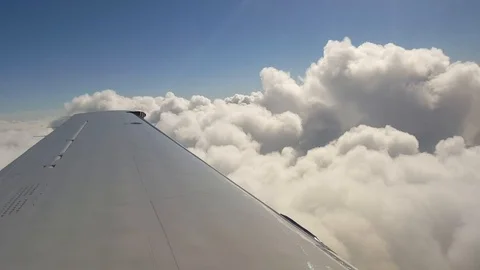 Airplane Flying Over Clouds Stock Footage 105325227