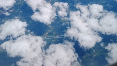 Airplane Flying Over Clouds Stock Footage 108983956