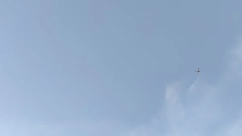 Airplane flying over clouds Stock Footage 327021538